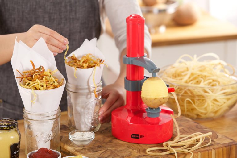 Dash DAP001RD Rapid Electric Potato Peeler Tool + Fruit Skinner with with BPA Free Plastic, Auto Shut Off Function, 2 Replacement Blades, Paring Utensil, & Recipe Book, Red - $33.95