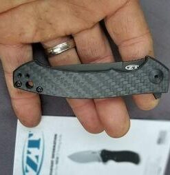 Zero Tolerance 0450CF; Folding Knife with 3.25” DLC-Coated S35VN Stainless Steel Blade, All-Black Carbon Fiber and Titanium Handle Scales, KVT Ball-Bearing Opening, Frame Lock, Pocketclip; 2.45 OZ. 41 31gnUvhBHL