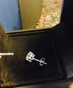 Amazon Essentials Plated Sterling Silver Cubic Zirconia Stud Earrings (Round & Princess) White/Platinum 6.5 mm Round Cut 33 41jPAJmQrtL