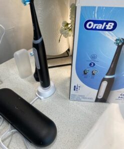 Oral-B iO Series 3 Limited Rechargeable Electric Powered Toothbrush, Black with 2 Brush Heads and Travel Case - Visible Pressure Sensor to Protect Gums - 3 Modes - 2 Minute Timer 56 51CTHIMBEZL