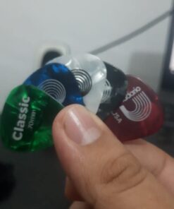 D'Addario Celluloid Guitar Picks - Guitar Accessories - Guitar Picks for Acoustic Guitar, Electric Guitar, Bass Guitar - Natural Feel, Warm Tone - Assorted, Medium 0.70mm, 10-pack 0.70mm-Medium 35 51xjLnDxpbL