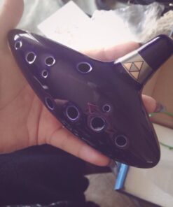 TOTMC Legend of Zelda Ocarina of Time Triforce Link 12 Hole Alto C Mediant Tone Ocarina Zelda Cosplay Ceramic Replica + Textbook Blue,Gold,Silver 61 613OjLQASL