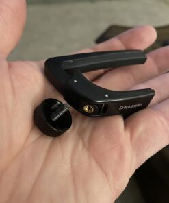 D'Addario Accessories Guitar Capo for Acoustic and Electric Guitar - NS Capo Lite - Adjustable Tension - Guitar Accessories - Works for 6 String Guitars - Lite - Black 19 616k5lym2L