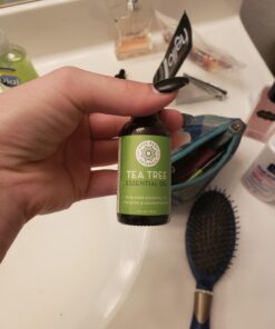 Tea Tree Essential Oil, 1 Fl Oz with Dropper - Undiluted Therapeutic Grade for Your Face, Skin, Hair and Diffuser - 100% Pure Melaleuca Oil for Acne, Toenails - by Pure Body Naturals 1 Fl Oz (Pack of 1) 41 61G6HJKnx8L