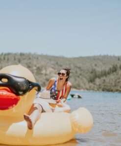 Game 5000-BB Giant Derby Float, Fun Rubber Duck, Quick-Fill Valves Pool Rafts & Inflatable Ride-ons, 300 lb Capacity, Built-In Cup Holders, 81” L x 76” W x 44” T Without Pump 37 61QTqozF5IL