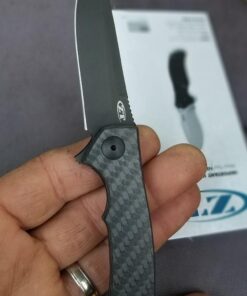 Zero Tolerance 0450CF; Folding Knife with 3.25” DLC-Coated S35VN Stainless Steel Blade, All-Black Carbon Fiber and Titanium Handle Scales, KVT Ball-Bearing Opening, Frame Lock, Pocketclip; 2.45 OZ. 43 61VpTXUzIhL