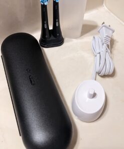 Oral-B iO Series 3 Limited Rechargeable Electric Powered Toothbrush, Black with 2 Brush Heads and Travel Case - Visible Pressure Sensor to Protect Gums - 3 Modes - 2 Minute Timer 49 61YuQeUt L