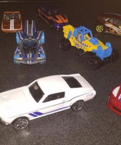 Hot Wheels Basic Car 9-Pack of 1:64 Scale Vehicles with 1 Exclusive Car, Modern & Vintage Models, Toy for Collectors & Kids 3 Years Old & Older 27 61eChW8kjLL 1