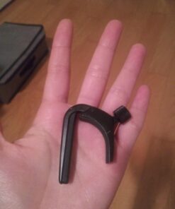 D'Addario Accessories Ukulele Pro Capo - For Soprano, Concert, Tenor, Baritone Ukuleles - 4 String Ukulele Capo - Micrometer Tension Adjustment for Buzz-Free, In-Tune Performance - Black 1 Pack 31 61nRFSILHUL