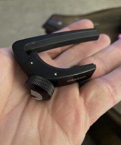 D'Addario Accessories Guitar Capo for Acoustic and Electric Guitar - NS Capo Lite - Adjustable Tension - Guitar Accessories - Works for 6 String Guitars - Lite - Black 20 61sbCCzLbWL