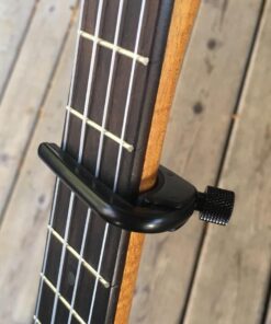 D'Addario Accessories Ukulele Pro Capo - For Soprano, Concert, Tenor, Baritone Ukuleles - 4 String Ukulele Capo - Micrometer Tension Adjustment for Buzz-Free, In-Tune Performance - Black 1 Pack 40 61yOygGPK7L