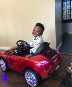 Roadster Ride On Kids Car w/Remote Control for Kids | 12V Power Battery Licensed Kid Car to Drive with 3 Speeds, LED Lights, Dining Table, Leather Seat 27 71129xuiNL