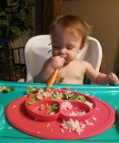 ezpz Mini Mat (Coral) - 100% Silicone Suction Plate with Built-in Placemat for Infants + Toddlers - First Foods + Self-Feeding - Comes with a Reusable Travel Bag - 6 Months+ Coral 35 711BYSvKv0L