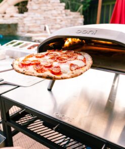 ooni Pizza Turning Peel – Pizza Turner - Long Handle Lightweight Metal Pizza Peel for Making Homemade Pizza Outdoor Pizza Oven Accessories 11 711brhr5loL