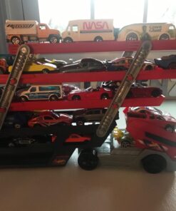 Hot Wheels Playset with Hw MEGA Hauler Toy Truck & 1:64 Scale Car, Stores 50+ Vehicles, Expands to 6 Levels red 31 712WakBxr L
