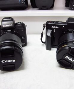 Canon Cameras US EOS M5 EF-M 18-150 STM KIT 24.2 Digital SLR Camera with 3.2" LCD, Black 18-150mm Base 41 713alD7bMnL