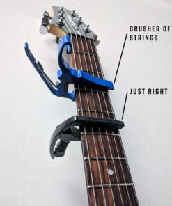 D'Addario Accessories Guitar Capo – NS Tri Action - For 6-String Electric and Acoustic Guitars – Micrometer Tension Adjustment for Buzz-Free, In-Tune Performance – Integrated Pick Holder, Black (PW-CP-09) Tri-Action Capo 27 714d2QGO 7L