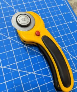 OLFA 45mm Ergonomic Rotary Cutter (RTY-2/DX) - Rotary Fabric Cutter w/ Blade Cover & Squeeze Trigger for Quilting, Sewing, Crafts, Replacement Blade: OLFA RB45-1H 49 715Kq2FB8oL
