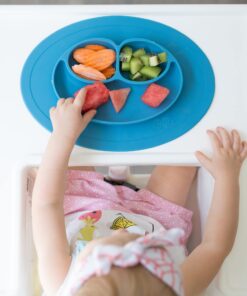 ezpz Mini Mat (Coral) - 100% Silicone Suction Plate with Built-in Placemat for Infants + Toddlers - First Foods + Self-Feeding - Comes with a Reusable Travel Bag - 6 Months+ Coral 25 71B9GnsVtWL 1