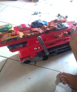 Hot Wheels Playset with Hw MEGA Hauler Toy Truck & 1:64 Scale Car, Stores 50+ Vehicles, Expands to 6 Levels red 42 71EqejFX3qL 2