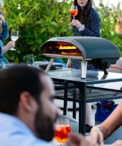 Ooni Koda 16 Gas Pizza Oven – 28mbar Outdoor Propane Pizza Oven - Portable Pizza Oven For Authentic Stone Baked 16 Inch Pizzas – Ideal for Any Outdoor Cooking Enthusiast - Countertop Pizza Oven 39 71F6 AXYIPL