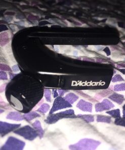 D'Addario Accessories Ukulele Pro Capo - For Soprano, Concert, Tenor, Baritone Ukuleles - 4 String Ukulele Capo - Micrometer Tension Adjustment for Buzz-Free, In-Tune Performance - Black 1 Pack 36 71Fqynwi6L