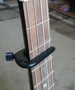 D'Addario Accessories Ukulele Pro Capo - For Soprano, Concert, Tenor, Baritone Ukuleles - 4 String Ukulele Capo - Micrometer Tension Adjustment for Buzz-Free, In-Tune Performance - Black 1 Pack 34 71GHVOa7U1L