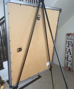 Amazon Basics Easel Stand, Instant Floor Poster, Lightweight, Collapsible and Portable with Tripod Base, Black Steel(supports 5 pounds) 27 71LFMovfq6L
