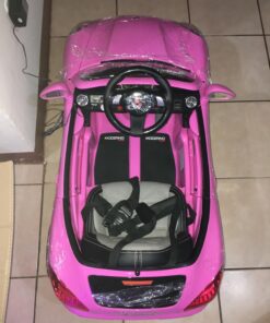 Moderno Kids Kiddie Roadster 12V Power Children Ride-On Car with R/C Parental Remote + Leather Seat 5 Point Seat Belt + LED Wheels + MP3 USB Music Player + Baby Tray Table + Rubber Floor Mats (Pink) Pink 68 71MFriZL3L