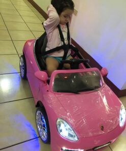 Moderno Kids Kiddie Roadster 12V Power Children Ride-On Car with R/C Parental Remote + Leather Seat 5 Point Seat Belt + LED Wheels + MP3 USB Music Player + Baby Tray Table + Rubber Floor Mats (Pink) Pink 69 71MddaQviNL