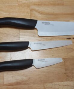 Kyocera Advanced Ceramics – Revolution Series 3-Piece Ceramic Knife Set: Includes 6-inch Chef's Knife; 5-inch Micro Serrated Knife; and 3-inch Paring Knife; Black Handles with White Blades 24 71NHIWhxnL