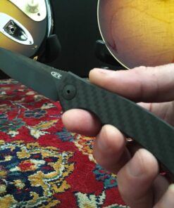 Zero Tolerance 0450CF; Folding Knife with 3.25” DLC-Coated S35VN Stainless Steel Blade, All-Black Carbon Fiber and Titanium Handle Scales, KVT Ball-Bearing Opening, Frame Lock, Pocketclip; 2.45 OZ. 36 71PmRJW4QL