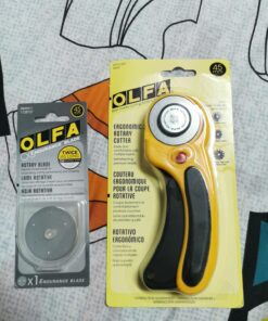 OLFA 45mm Ergonomic Rotary Cutter (RTY-2/DX) - Rotary Fabric Cutter w/ Blade Cover & Squeeze Trigger for Quilting, Sewing, Crafts, Replacement Blade: OLFA RB45-1H 60 71R3hKhVwXL