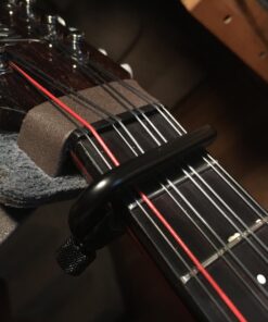 D'Addario Accessories Ukulele Pro Capo - For Soprano, Concert, Tenor, Baritone Ukuleles - 4 String Ukulele Capo - Micrometer Tension Adjustment for Buzz-Free, In-Tune Performance - Black 1 Pack 42 71WDPWSPl1L