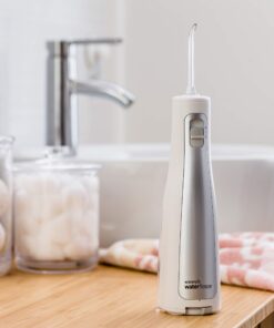 Waterpik Water Flosser Cordless Dental Oral Irrigator for Teeth with Portable Travel Bag and 3 Jet Tips, Cordless Freedom ADA Accepted, WF-03, White 23 71bieI3P2kL