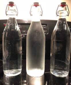 Bormioli Rocco Giara Swing Top Bottles 33 ¾ Ounce-4 Pack Round Clear Glass Grolsch Flip Top Bottle With Stopper, for Beverages, Smoothies, Kefir, Beer, Soda, Juicing, Kombucha, Water, Milk and Vinegar 4 Pack 32 71blDf0Y L