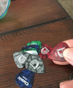 D'Addario Celluloid Guitar Picks - Guitar Accessories - Guitar Picks for Acoustic Guitar, Electric Guitar, Bass Guitar - Natural Feel, Warm Tone - Assorted, Medium 0.70mm, 10-pack 0.70mm-Medium 42 71fIV0SXzrL