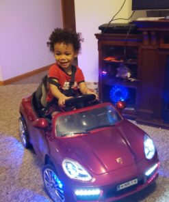 Roadster Ride On Kids Car w/Remote Control for Kids | 12V Power Battery Licensed Kid Car to Drive with 3 Speeds, LED Lights, Dining Table, Leather Seat 25 71fOvA6G3L