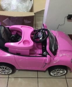 Moderno Kids Kiddie Roadster 12V Power Children Ride-On Car with R/C Parental Remote + Leather Seat 5 Point Seat Belt + LED Wheels + MP3 USB Music Player + Baby Tray Table + Rubber Floor Mats (Pink) Pink 79 71frh dhwHL 1