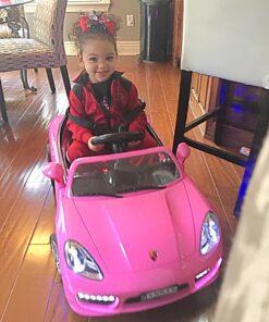 Moderno Kids Kiddie Roadster 12V Power Children Ride-On Car with R/C Parental Remote + Leather Seat 5 Point Seat Belt + LED Wheels + MP3 USB Music Player + Baby Tray Table + Rubber Floor Mats (Pink) Pink 61 71hRuZlUmuL