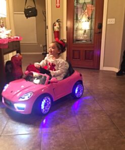 Moderno Kids Kiddie Roadster 12V Power Children Ride-On Car with R/C Parental Remote + Leather Seat 5 Point Seat Belt + LED Wheels + MP3 USB Music Player + Baby Tray Table + Rubber Floor Mats (Pink) Pink 60 71htQ8FTL