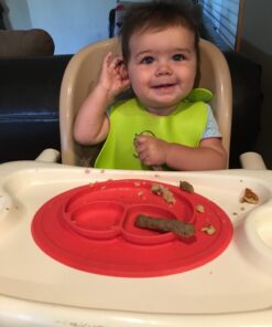 ezpz Mini Mat (Coral) - 100% Silicone Suction Plate with Built-in Placemat for Infants + Toddlers - First Foods + Self-Feeding - Comes with a Reusable Travel Bag - 6 Months+ Coral 39 71oIShHaLEL