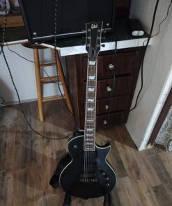 Elixir Strings - Nickel Plated Steel Electric Guitar Strings with NANOWEB Coating - Elixir Electric Guitar Strings - Medium (.011-.049) Medium (.011-.049) 1 Pack 15 71phs wE12L