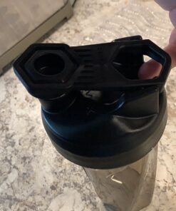 HELIMIX 2.0 Vortex Blender Shaker Bottle Holds Upto 28oz | No Blending Ball or Whisk | USA Made | Portable Pre Workout Whey Protein Drink Shaker Cup | Mixes Cocktails Smoothies Shakes | Top Rack Safe 28 oz Black 32 71rjouCTriL