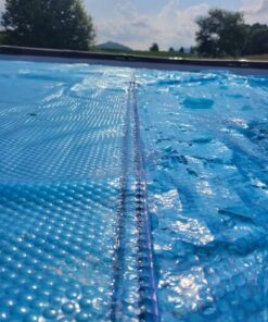 INTEX 28015E Solar Pool Cover: For 18ft Round Easy Set and Metal Frame Pools – Insulates Pool Water – Reduces Water Evaporation – Keeps Debris Out – Reduces Chemical Consumption 18 ft 28 71v5nRl54WL