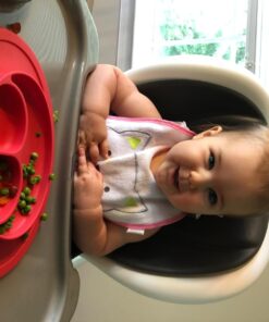 ezpz Mini Mat (Coral) - 100% Silicone Suction Plate with Built-in Placemat for Infants + Toddlers - First Foods + Self-Feeding - Comes with a Reusable Travel Bag - 6 Months+ Coral 33 71xaaxSF7L