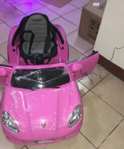 Moderno Kids Kiddie Roadster 12V Power Children Ride-On Car with R/C Parental Remote + Leather Seat 5 Point Seat Belt + LED Wheels + MP3 USB Music Player + Baby Tray Table + Rubber Floor Mats (Pink) Pink 83 71y5hu3qxOL