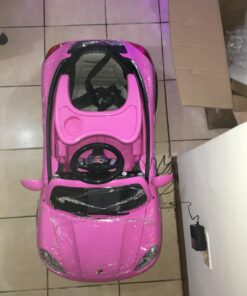 Moderno Kids Kiddie Roadster 12V Power Children Ride-On Car with R/C Parental Remote + Leather Seat 5 Point Seat Belt + LED Wheels + MP3 USB Music Player + Baby Tray Table + Rubber Floor Mats (Pink) Pink 84 71yUMIDH07L