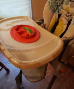 ezpz Mini Mat (Coral) - 100% Silicone Suction Plate with Built-in Placemat for Infants + Toddlers - First Foods + Self-Feeding - Comes with a Reusable Travel Bag - 6 Months+ Coral 41 71zdEqlI1cL
