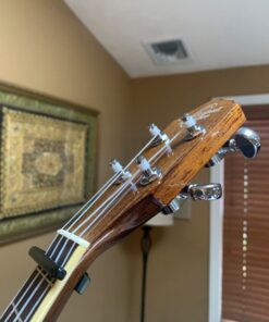 D'Addario Accessories Ukulele Pro Capo - For Soprano, Concert, Tenor, Baritone Ukuleles - 4 String Ukulele Capo - Micrometer Tension Adjustment for Buzz-Free, In-Tune Performance - Black 1 Pack 29 813kV33IplL